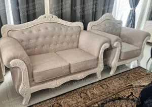 Close view of restored beige fabric chesterfield sofa jati and armchair with carved frame by Mr Sofa Taman Melawati