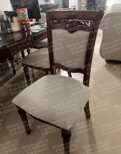 Repaired dining chair in Ampang KL by Mr Sofa with new seat fabric, restored backrest support and wooden frame.