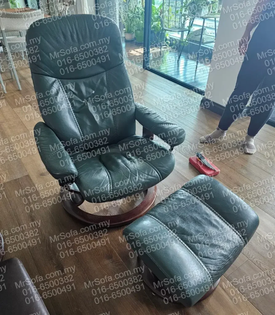 stressless-recliner-cracked-footstool-before-restoration